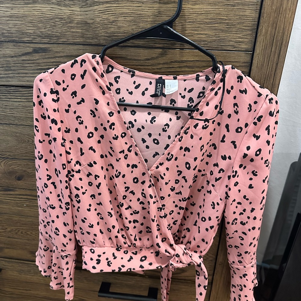 Divided Pink Wrap Tie Front Blouse